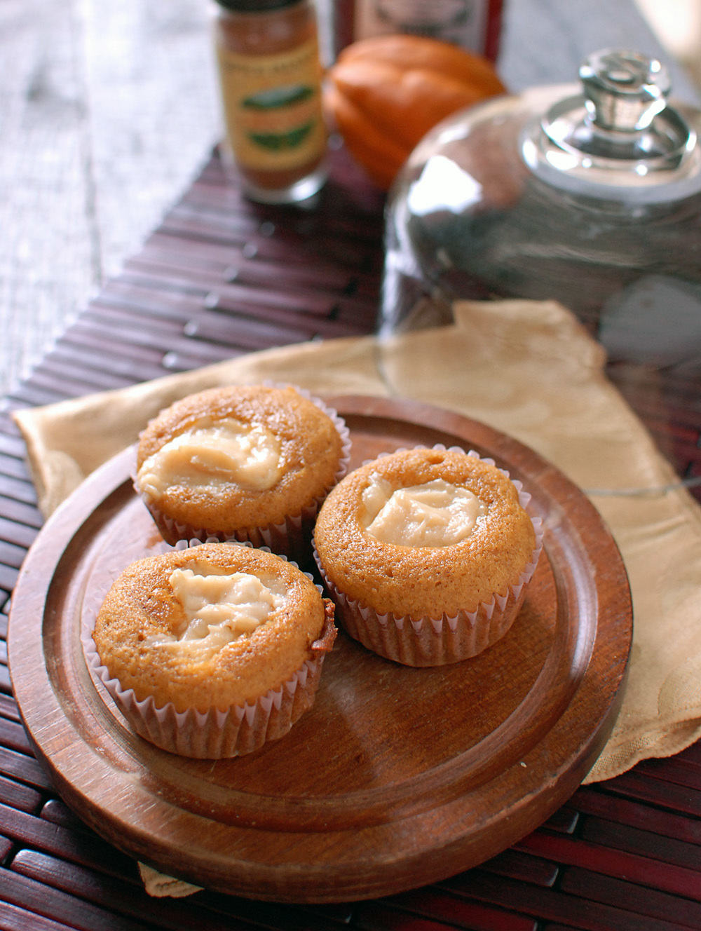 Pumpkin Cupcakes with Molasses Cream Cheese Filling